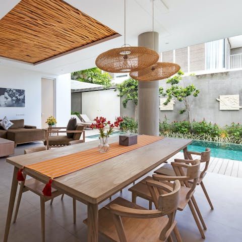 Gather over meals in the fresh air of the open-plan living space