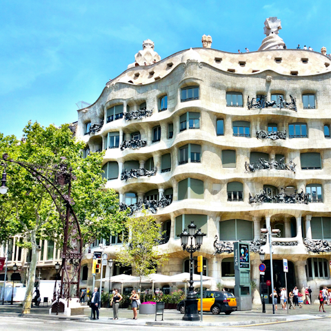 Check out the famous Casa Milá, fifteen minutes away