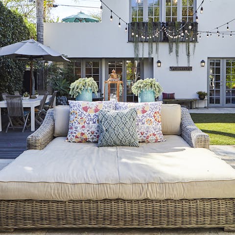 Lounge out on the enormous daybed with your holiday read