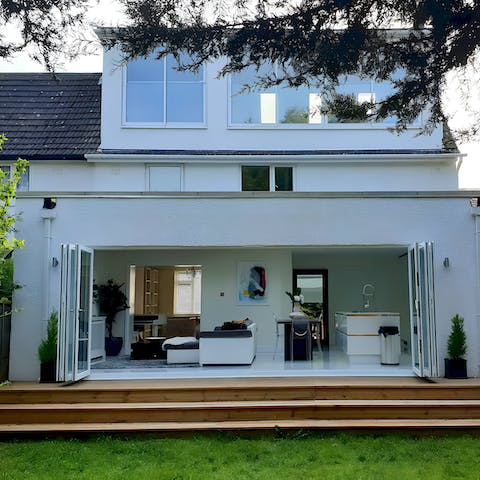 Open up the patio doors to blend the indoor and outdoor spaces