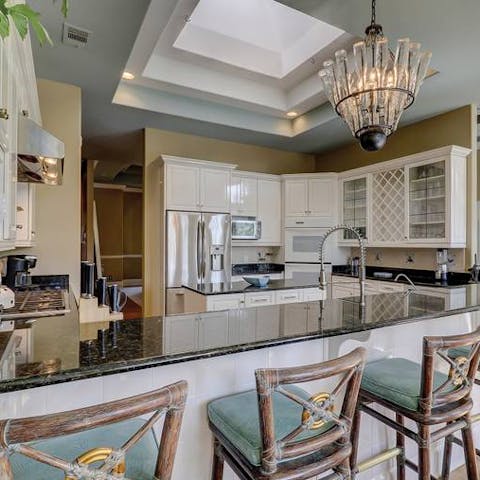 Cook while enjoying lively conversation in the exquisite kitchen