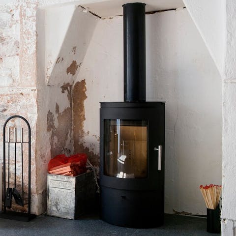 Cosy up around the fireplace
