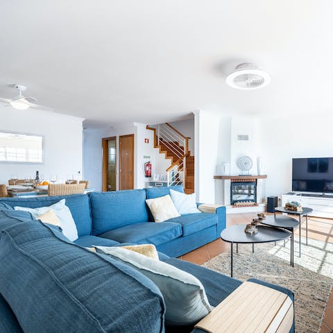 Get cosy on the sumptuous blue sofa after a long day on your feet – take turns stargazing with the telescope