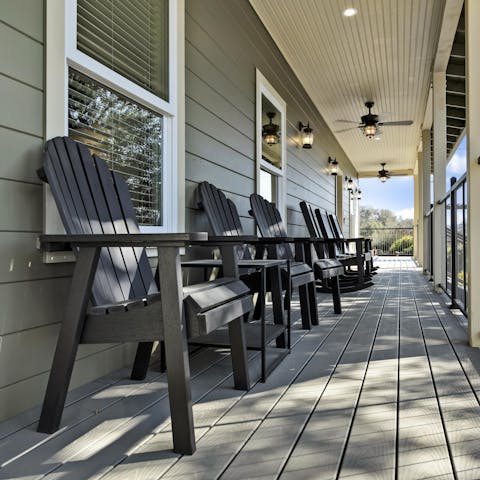 Sip your favourite wine of the day on the porch