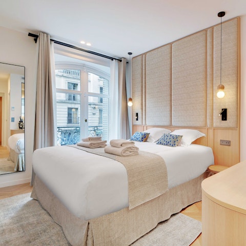 Watch Paris bustle below from the Juliet balcony windows
