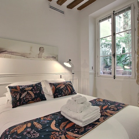 Wake up and enjoy coffee on the small private patio