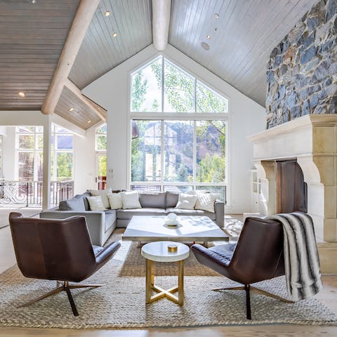 Recline on the L-shaped sofa with a hot chocolate in the grand living area