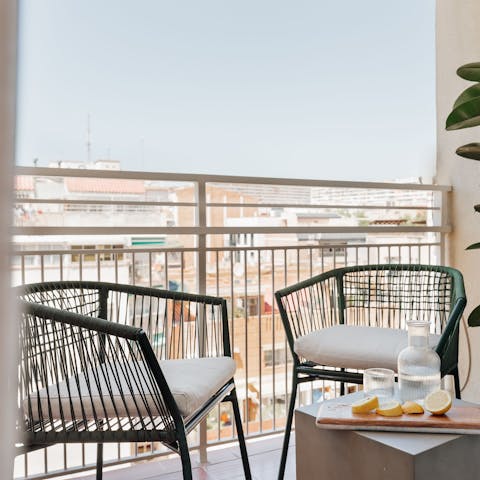 Sip your morning coffee on the private balcony as Barcelona wakes below
