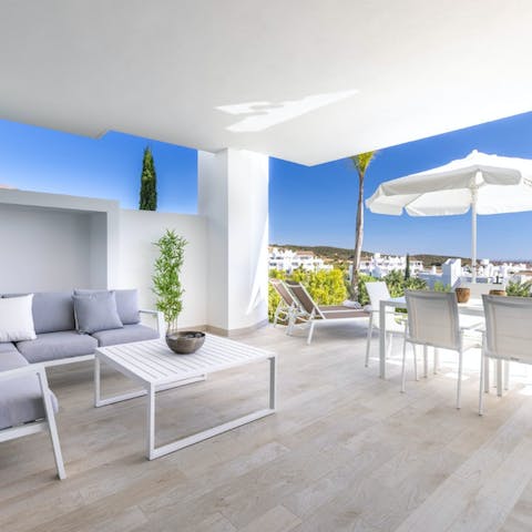 Tuck into a delicious lunch while admiring the views from your covered terrace