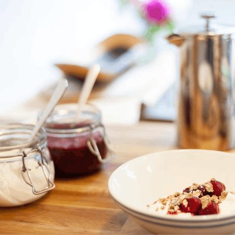 Enjoy the fresh breakfast hamper, topped up daily, with homemade bread, compote, and more