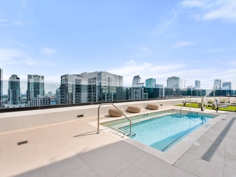 Swim in the communal pool set above the city skyline