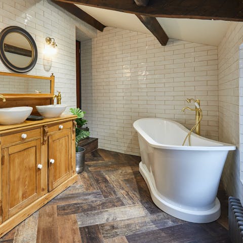 Relax with a glass of wine in a bubble bath