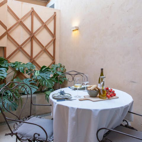 Savour Italian wine and fresh local produce on the terrace