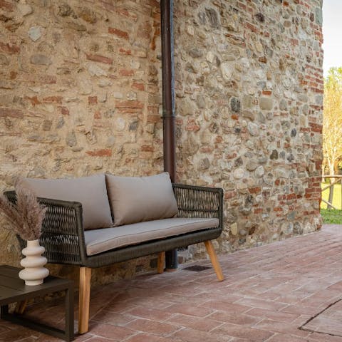 Sip a pre-dinner glass of wine in the communal gardens