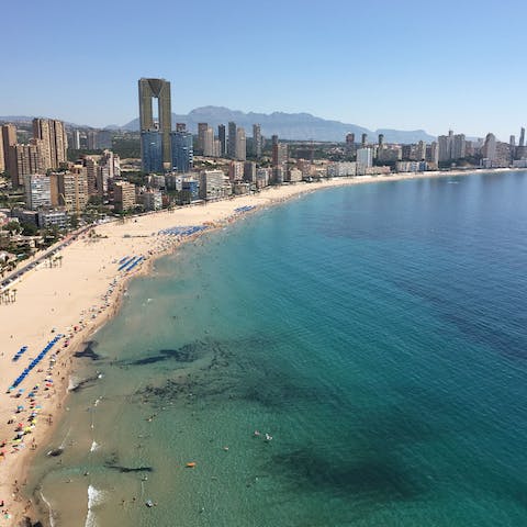 Enjoy the sandy beaches and vibrant scene of Benidorm