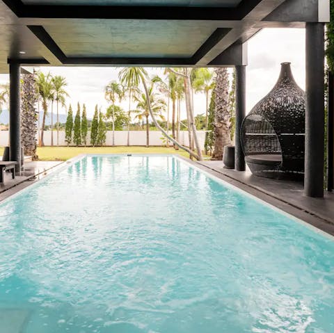 Enjoy moments of zen by the luxurious, covered outdoor pool