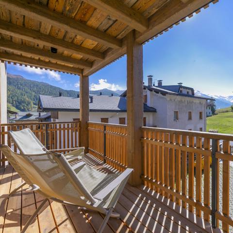 Relax on the balcony after a long day of exploring the mountains