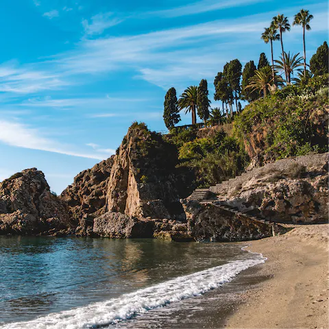 Head to the beaches of Nerja – a short drive away