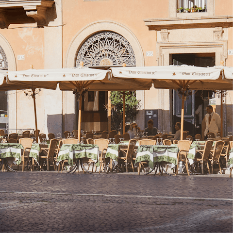 Soak up the atmosphere from a local restaurant