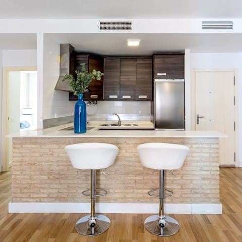 Take a perch at the bricked breakfast bar for your morning coffee