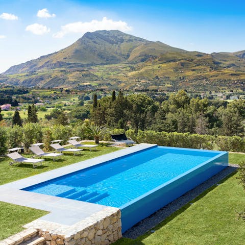 Admire the mountain views from the private pool