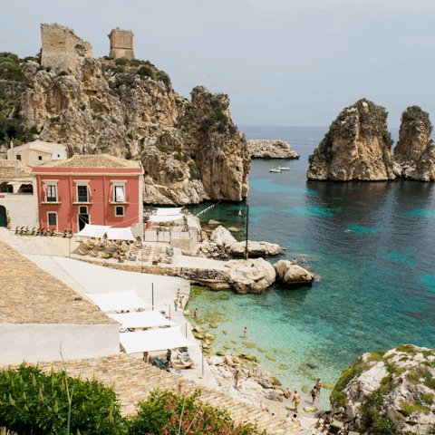 Enjoy a swim in the sea at nearby Scopello