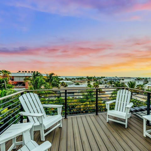 Pour yourself a drink and watch the sunset from the rooftop terrace