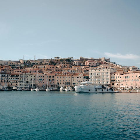 Take a train from nearby Donoratico to the port city of Livorno
