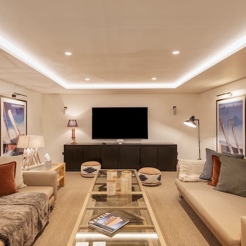 Settle in for a movie night in the home cinema – there's a full sound system in here for total movie immersion