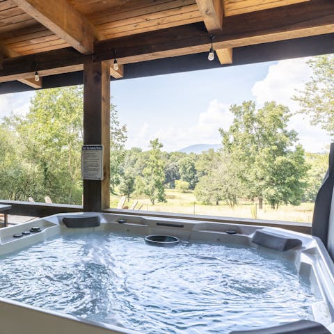 Soak sore muscles in the panoramic hot tub