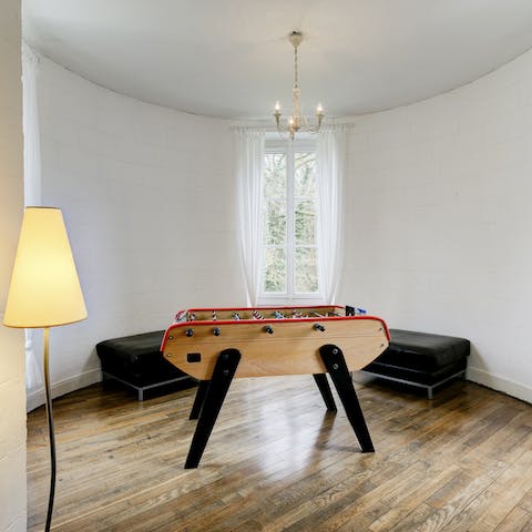 Hole up in the turret's games room for a round or two of foosball