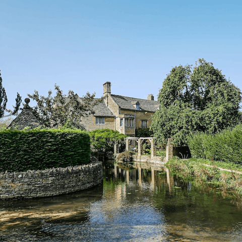 Pay a visit to the pretty village of Bourton-on-the-Water, just over a quarter of an hour away in the car