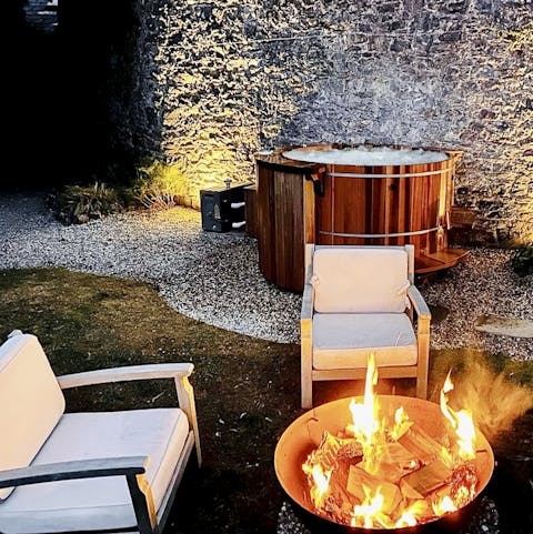 Take a dip in the hot tub before gathering around the fire pit