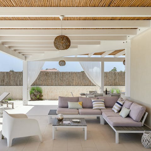 Sip your morning coffee on the outdoor sofa