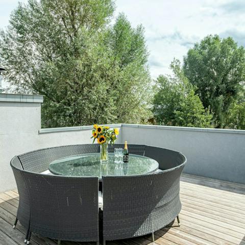 Serve refreshing sunset drinks on the rooftop terrace