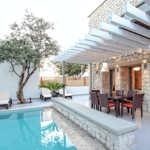 Fire up the barbecue and lay the table for an atmospheric evening meal