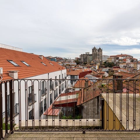 Take in the vistas of the city's cathedral from the private balcony