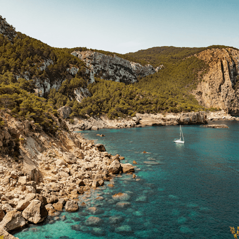Fall in love with the magic of Ibiza while exploring the beaches