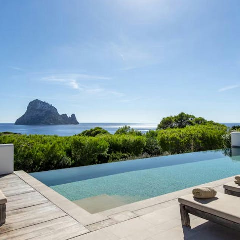 Enjoy incredible views while lounging by the pool