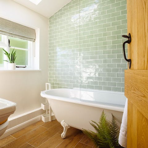 Treat yourself to a truly indulgent soak in the clawfoot bathtub