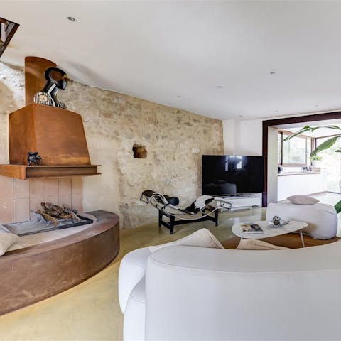 Relax in the lounge, with its wood burner for cosy evenings