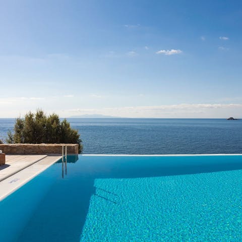 Jump into the swimming pool and admire the vista while doing backstroke