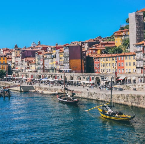 Head to the waterfront of Cais da Ribeira, a thirty-five minute stroll away
