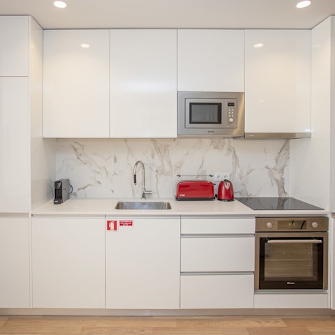 Fire up the coffee pod machine in the sleek, modern kitchen