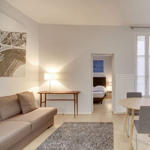 Relax in the living room with a glass of French rosé wine after a busy day in Paris