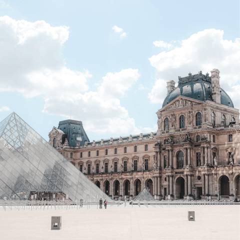 Browse the iconic artworks at the Louvre Museum – it's within walking distance