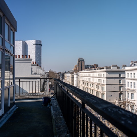 Peer out over Kensington's rooftops from the balcony