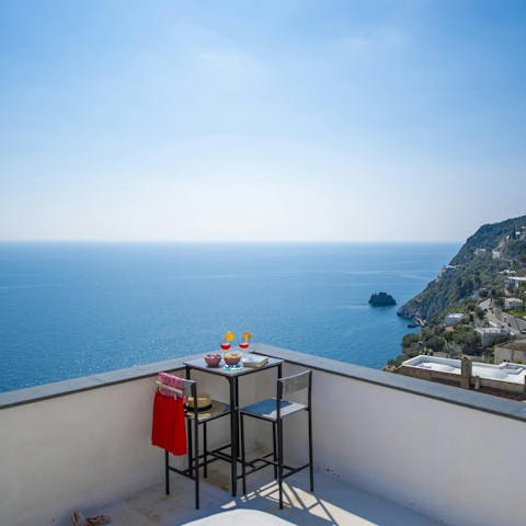 Soak up the sun with an aftertoon cocktail on the rooftop terrace