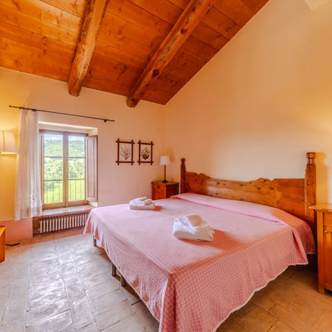 Sleep beneath ancient beams and wake to sweeping views