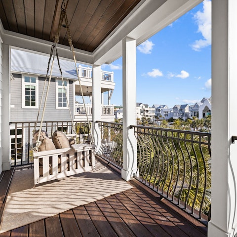 Relax on the balcony swing seat with your morning coffee